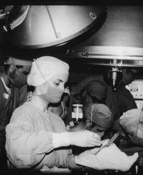 The first successful adult heart transplant performed in the United States, captured in the last frame of a surgical resident’s film. Among those pictured are nurse Bernadine Hartman and Drs. Norman Shumway, Edward Stinson and Denver Nelson.