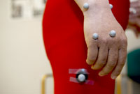 tai chi master's hand with motion capture balls glued to it