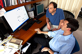 Euan Ashley (right), Stephen Quake and several dozen colleagues used Quake’s genome squence to predict his health risks