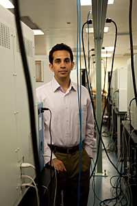 Medical student Keyan Salari, pictured here among genome sequencing machines, led a historic class on genomics in medicine.