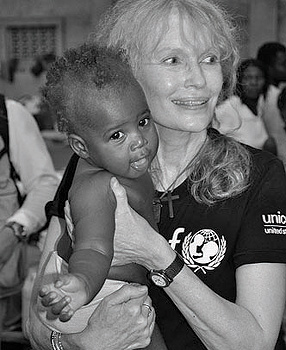 Mia Farrow and refugee child